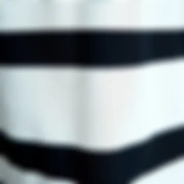 Fabric Texture Exploration Close-up of the fabric texture of a black and white striped long sleeve shirt