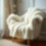 Luxurious white fuzzy shawl draped elegantly over a chair