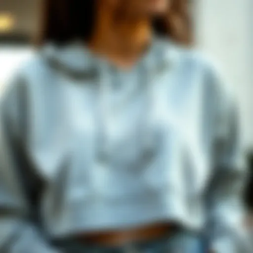 Cropped Sweatshirt with Innovative Drawstring Design Cropped sweatshirt showcasing drawstring detail