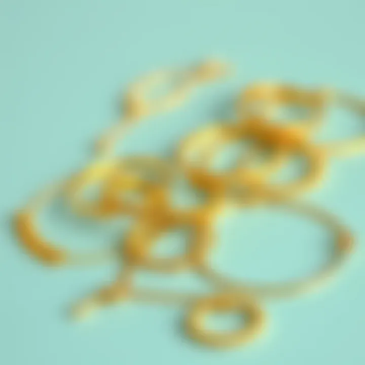 Variety of Gold Anklet Extenders Different styles of gold anklet extenders arranged artistically.