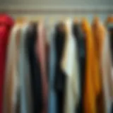 A collection of stylish cardigan sweaters in various colors and textures hanging on a rack.