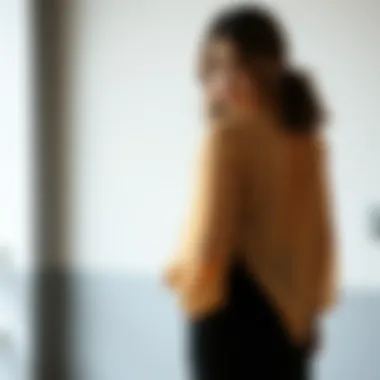 Elegant long sleeve chiffon jacket draped over a stylish outfit