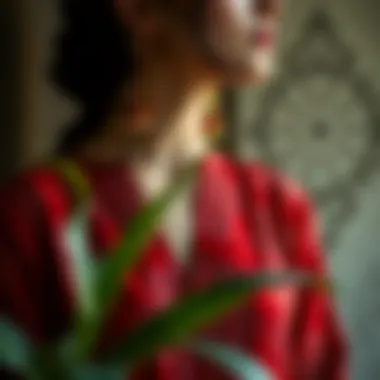 Elegant red printed blouse with intricate patterns