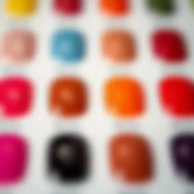 Close-up of a nail gel color card with a variety of shades reflecting different finishes.