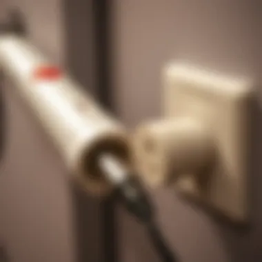 A travel adapter connecting a curling iron to an international outlet.