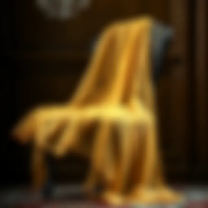 A luxurious gold organza shawl draped elegantly over a vintage chair