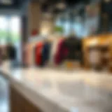 Elegant display of clothing on a table with anti-slip protector