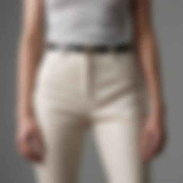 Fashion model wearing pants with visible button extension, emphasizing style and comfort