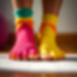 A close-up of colorful toesocks designed for yoga practice, showcasing their unique toe separation feature.